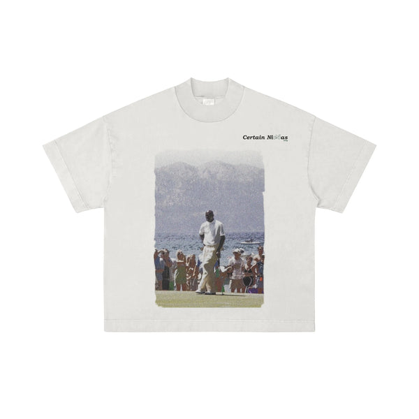 white oversized boxy fit t-shirt with golfer graphic and certain necessities branding – west coast streetwear