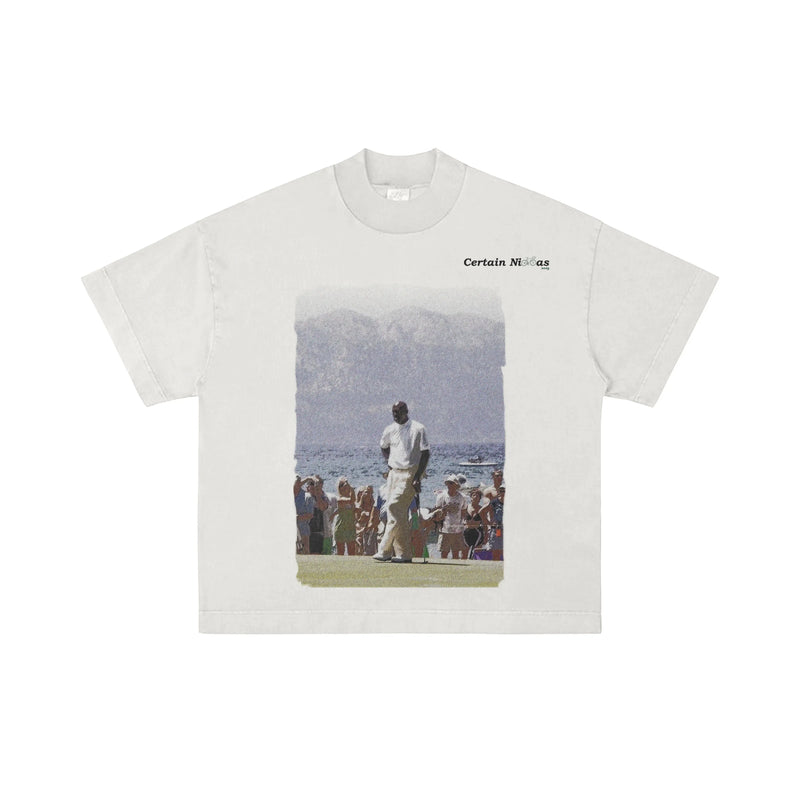 white oversized boxy fit t-shirt with golfer graphic and certain necessities branding – west coast streetwear